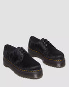 Bei PICK UP in Düsseldorf findest Du Dr. Martens, 1461 Quad Black Hair On  und viel mehr von Dr. Martens