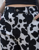 Bei PICK UP in Düsseldorf findest Du Run & Fly, Black & White Cow Print Straight Leg Trousers  und viel mehr von RUN & FLY
