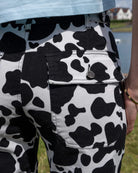 Bei PICK UP in Düsseldorf findest Du Run & Fly, Black & White Cow Print Straight Leg Trousers  und viel mehr von RUN & FLY